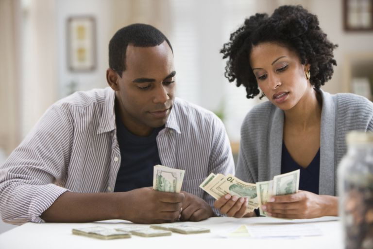 Couples planiing budget together
